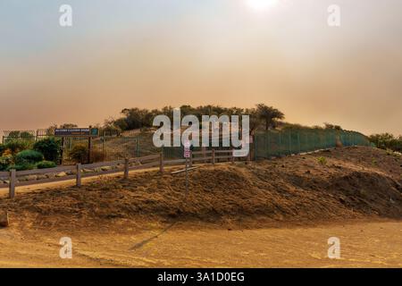 Los Angeles, California - January 8, 2025: The entrance to Runyon Canyon shrouded in haze from wildfires, highlighting the impact of smoke on the surr Stock Photo