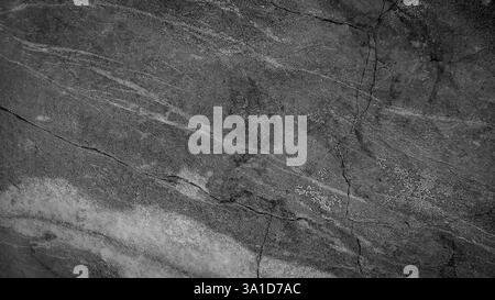 Dark black and white old cement wall background, abstract design has light colors with gradient background. Stock Photo