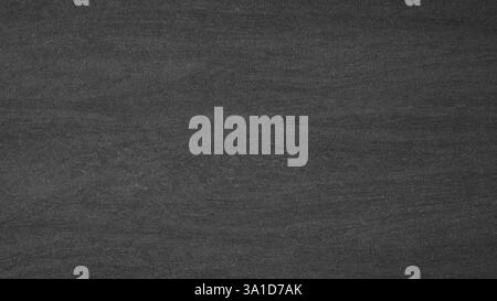 Dark black and white old cement wall background, abstract design has light colors with gradient background. Stock Photo