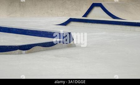 Unique skate park features with blue ramps and smooth surfaces for ...