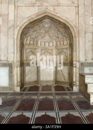 Detail of red sandstone panel with white marble inlay on exterior of ...