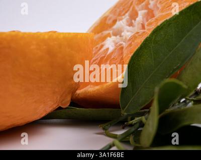 Close up of tangerines with leaves Stock Photo