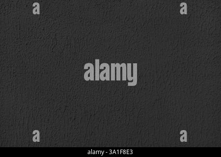 Old plaster surface, texture stucco background, close up grunge texture of black painted cement, concrete wall texture. Wallpaper, backdrop, architect Stock Photo