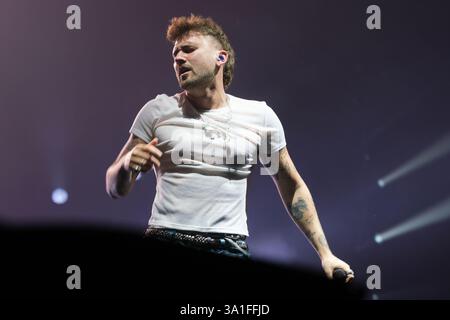 Singer Dani Fernandez performs during a concert at the Movistar Arena with Yaren, on March 8, 2025, in Madrid Stock Photo