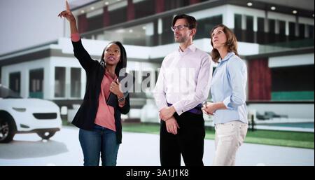 African American realtor showing young couple luxurious real estate options. Stock Photo