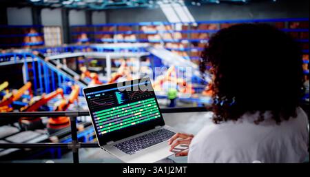 Engineer Worker Using Warehouse Automation Dashboard In Logistic Center Stock Photo