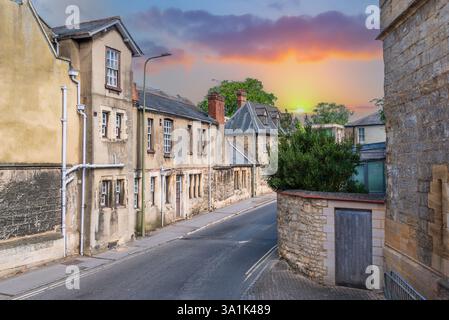 Charming Oxfordshire rustic street at sunset with traditional British architecture and a historical road in a daytime Stock Photo
