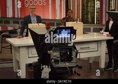 A camera captures the action of "The Goods" show in Canada, highlighting the behind-the-scenes process of the popular TV program, showcasing the produ Stock Photo