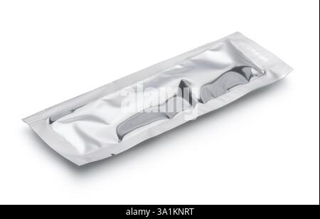 Silver foil packaging  sachet isolated on white Stock Photo