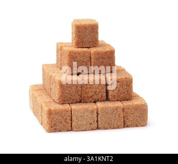 Pyramid of brown cane sugar cubes isolated on white Stock Photo