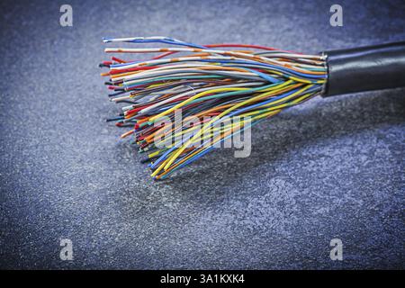 Multicolored electric cables on black background electricity concept Stock Photo