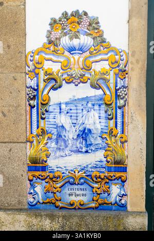 Blue azulejos with motifs from Douro Valley, train station of Pinhao, Portugal Stock Photo