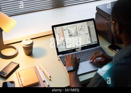 Designer Creating Online Project On Laptop Stock Photo