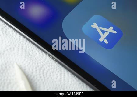 A close up of an iPad screen displaying the Apple app store Stock Photo