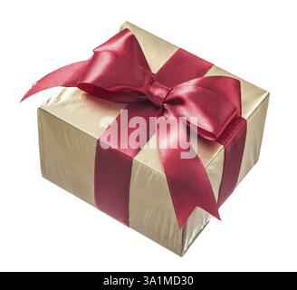 Present wrapped in glittery paper with red kNAt isolated on white Stock Photo