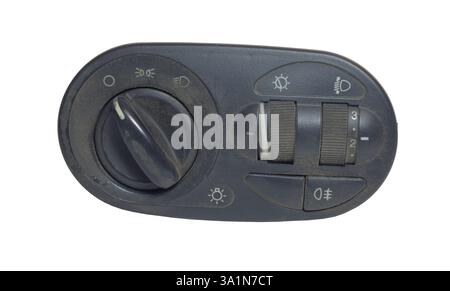 headlight switch with control wheels of headlight corrector and dashboard brightness level. in one module, isolated on white background, with clipping Stock Photo