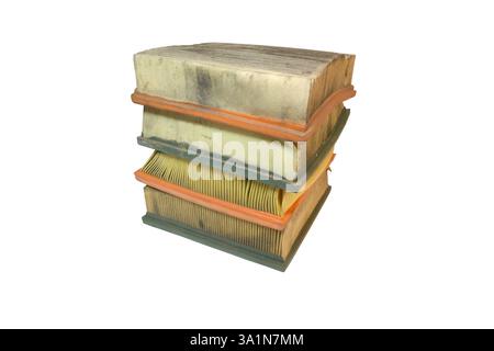 engine air filters neat stack, rectangular, with soft seal on rubber edge. Paper filter, dusty, worn, crumpled when replacing. isolated on white backg Stock Photo