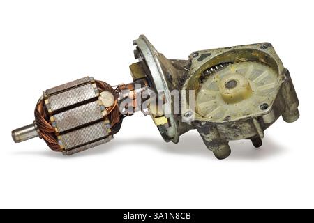 disassembled car windshield wipers permanent magnet DC motor. armature with collector in gear housing with plastic ring gear, isolated on white backgr Stock Photo