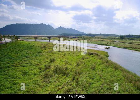 Sunchang County, South Korea - October 4, 2021: A bridge spans the Seomjin River, connecting the lush, green valley with rolling mountains in the dist Stock Photo