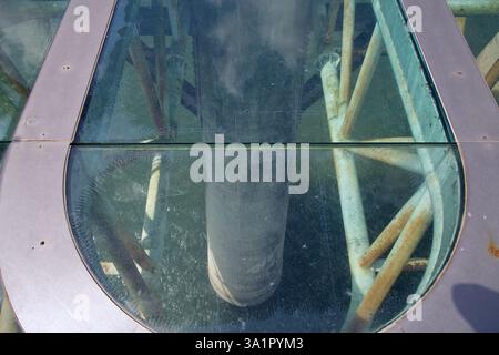 Sunchang County, South Korea - October 3, 2021: A view through the glass-bottom Skywalk of Hyangga Bridge, revealing the bridge's steel framework and Stock Photo