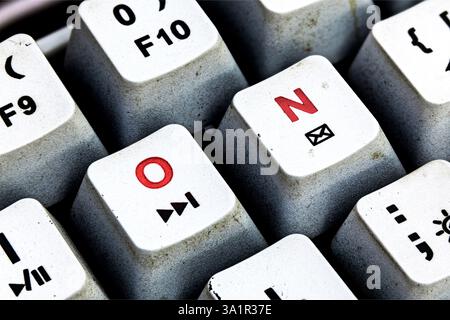 ON keyboard keys. Dirty Keyboard with ON written in red color Stock Photo