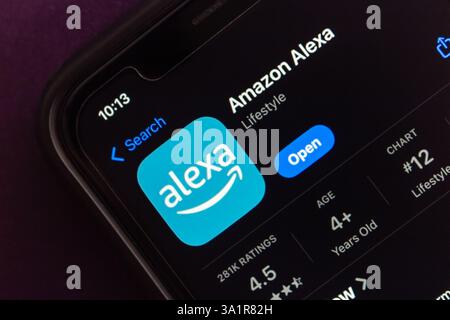 Amazon Alexa app on App Store. Alexa app is a mobile app used to manage Alexa devices, control smart homes, and access voice assistant features. Stock Photo