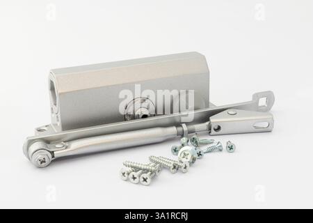 Hydraulic Door Closer with Adjustable Arm and Mounting Screws on White isolated Background Stock Photo