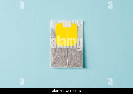 Top view of tea bag on blue background Stock Photo