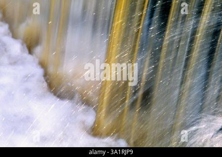 Waterfall with water splashing in a river Stock Photo