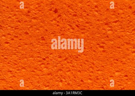 orange porous foam abstract sponge background design element Stock Photo