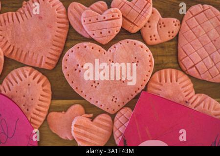 Pink Heart Shaped Valentines Day Cookies On Cutting Board Stock Photo