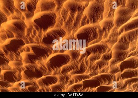 Abstract circular pattern in the sand - Natural orange background Stock Photo