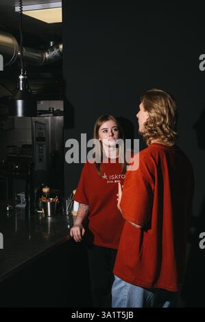 waiters talking in the kitchen Stock Photo