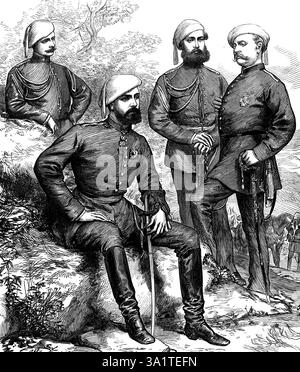 The Civil War in Spain: Don Carlos and his staff, 1873. Portrait of '...the Carlist Pretender now at the head of the insurrection in Spain, accompanied by his staff of officers...The Prince who claims to be King of Spain is seated in the centre of this group; Palacio is at his left hand; Polo, the brother-in-law of Don Carlos, is on his right hand; Marichalar stands in the middle...This Prince, Charles VII., who is known by the name of Don Carlos, is a tall young man of athletic build, with manners so affable and princely that seeing him in a drawing-room you would involuntarily exclaim, &quot Stock Photo