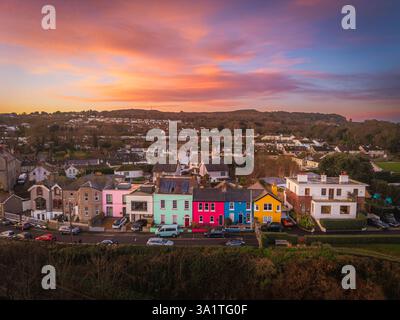 Sunrise sky over colourful houses in Howth Stock Photo