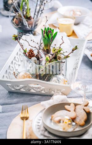Beautiful table serving for Easter celebration in dining room Stock Photo