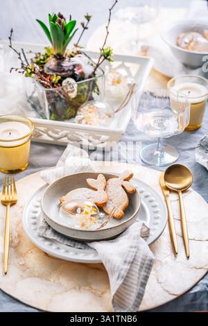 Beautiful table serving for Easter celebration in dining room Stock Photo