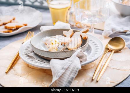 Beautiful table serving for Easter celebration in dining room Stock Photo