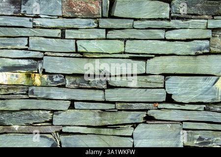 Cut slate brick wall Stock Photo
