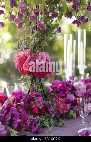 Luxurious Outdoor Wedding Reception with Stunning Floral Arrangements Stock Photo