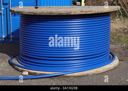 blue fiber optic cable on the street Stock Photo