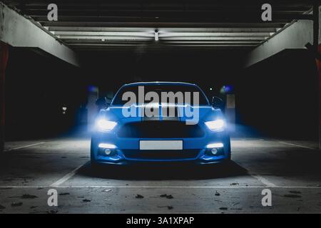 2018 Ford Mustang GT S550 5.0 head-on with headlights / dipped beam and sidelights Stock Photo
