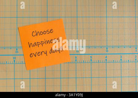 Colorful paper note with sticky tape with motivational phrases, Perfect for goal setting, planning and self-motivation. Stock Photo