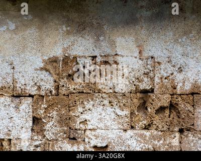 Stone brick of old castle or cathedral wall texture, Ancient limestone exterior buildings background. Stock Photo