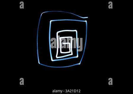 Light painting square spiral photography, black on white, blue Stock Photo