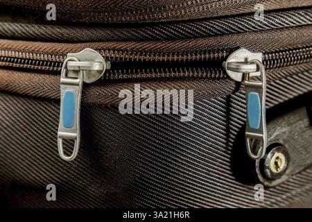 Close-up of the zipper of a black suitcase Stock Photo
