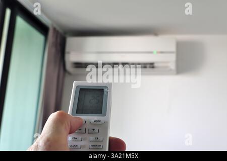 Hand operated remote control for air conditioner, Pattaya, Chonburi, Thailand, Asia Stock Photo