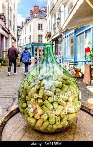 Large jar full of wine bottle corks outside wine merchants shop - Loches, Indre-et-Loire (37), France. Stock Photo