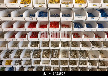 Organized Storage of Small Hardware Parts in Individual Plastic Containers Stock Photo