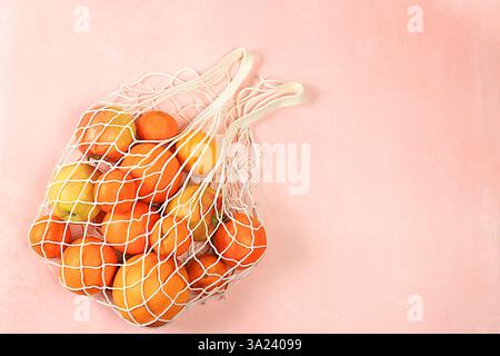 Dietary fruits in fabric packaging. Banner for store. Healthy natural products in eco bag to boost immunity, healthy lifestyle concept, zero waste. No Stock Photo